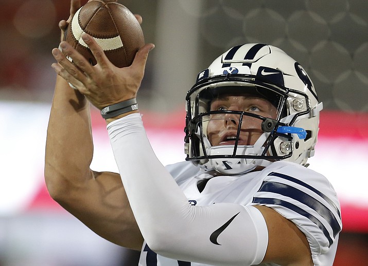 In this Sept. 1, 2018 file photo BYU linebacker Sione Takitaki (16) handles the ball in the first half during an NCAA college football game against Arizona in Tucson, Ariz. BYU will be looking to close out a roller coaster season when it faces Western Michigan in the Famous Idaho Potato Bowl in Boise on Friday, Dec. 21, 2018. (Rick Scuteri/AP, file)