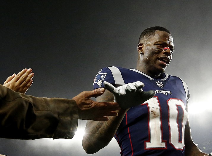 New England Patriots wide receiver Josh Gordon is congratulated after an NFL football game against the Minnesota Vikings on Dec. 2, 2018, at Gillette Stadium, in Foxborough, Mass. (Winslow Townson/AP, File)
