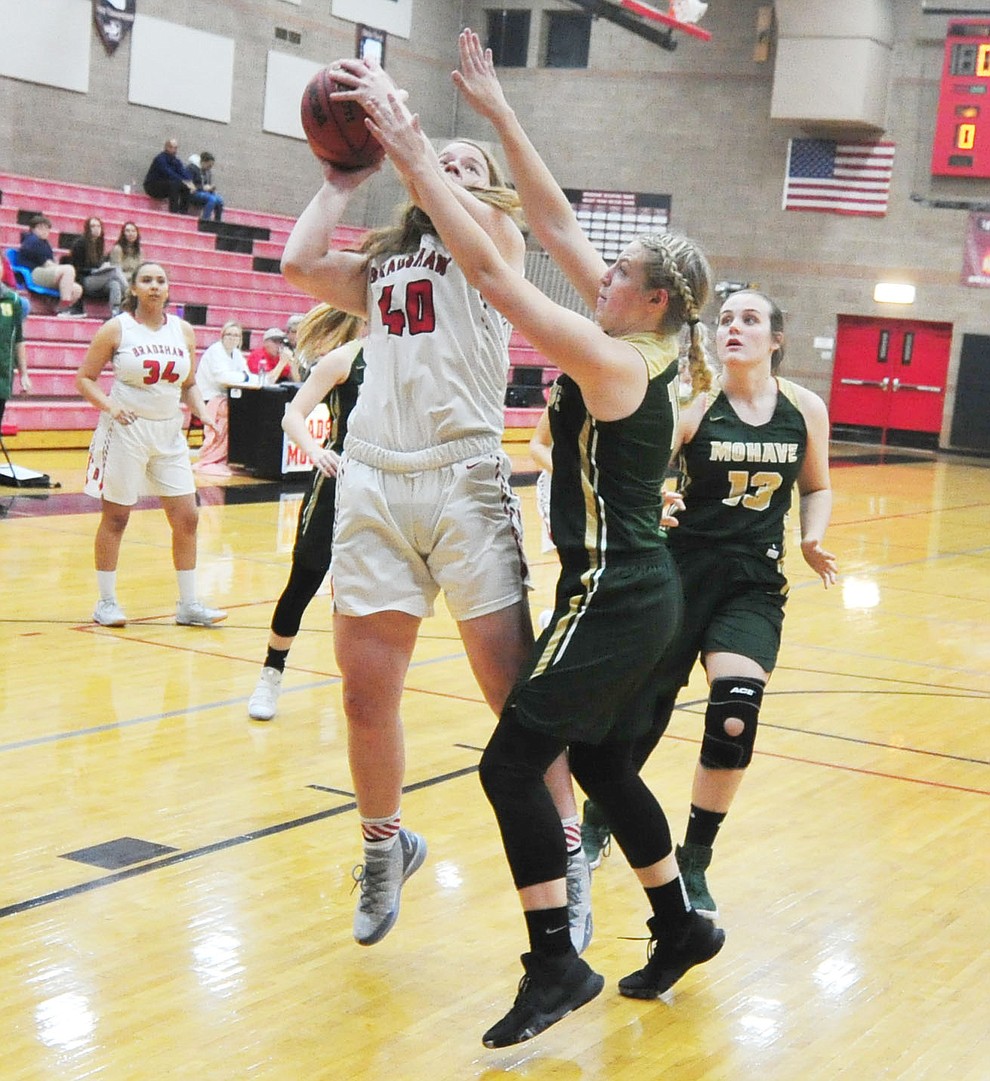 Bradshaw Mountain's Delanie Clark powers up for a shot as the Bears host the Mohave Thunderbirds in a basketball matchup Friday night in Prescott Valley. (Les Stukenberg/Courier).