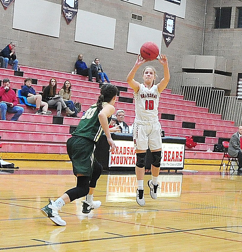 Bradshaw Mountain's Brinlee Kidd takes a long range jump shot as the Bears host the Mohave Thunderbirds in a basketball matchup Friday night in Prescott Valley. (Les Stukenberg/Courier).
