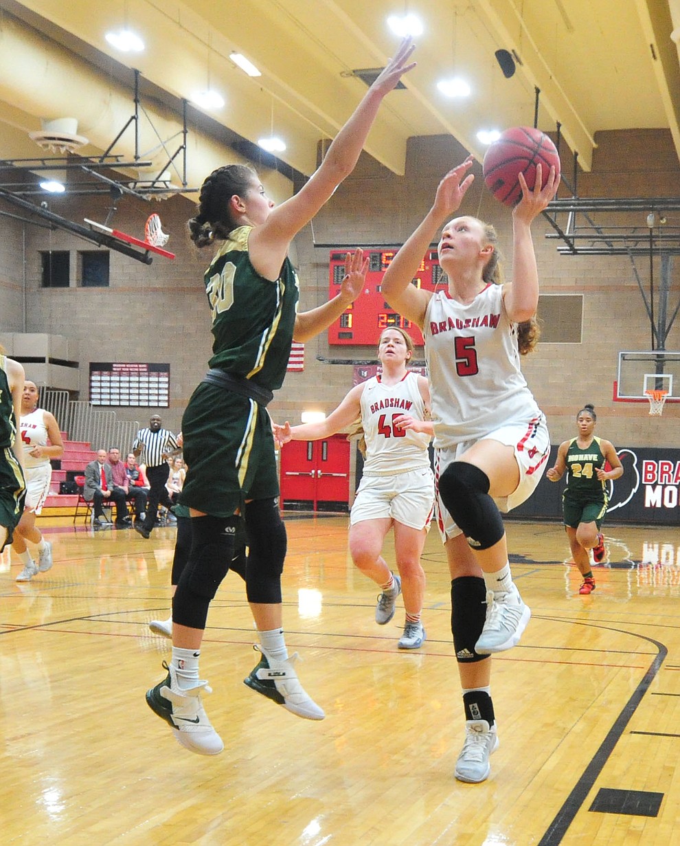 Bradshaw Mountain's Sierra Woolley drives through the lane as the Bears host the Mohave Thunderbirds in a basketball matchup Friday night in Prescott Valley. (Les Stukenberg/Courier).