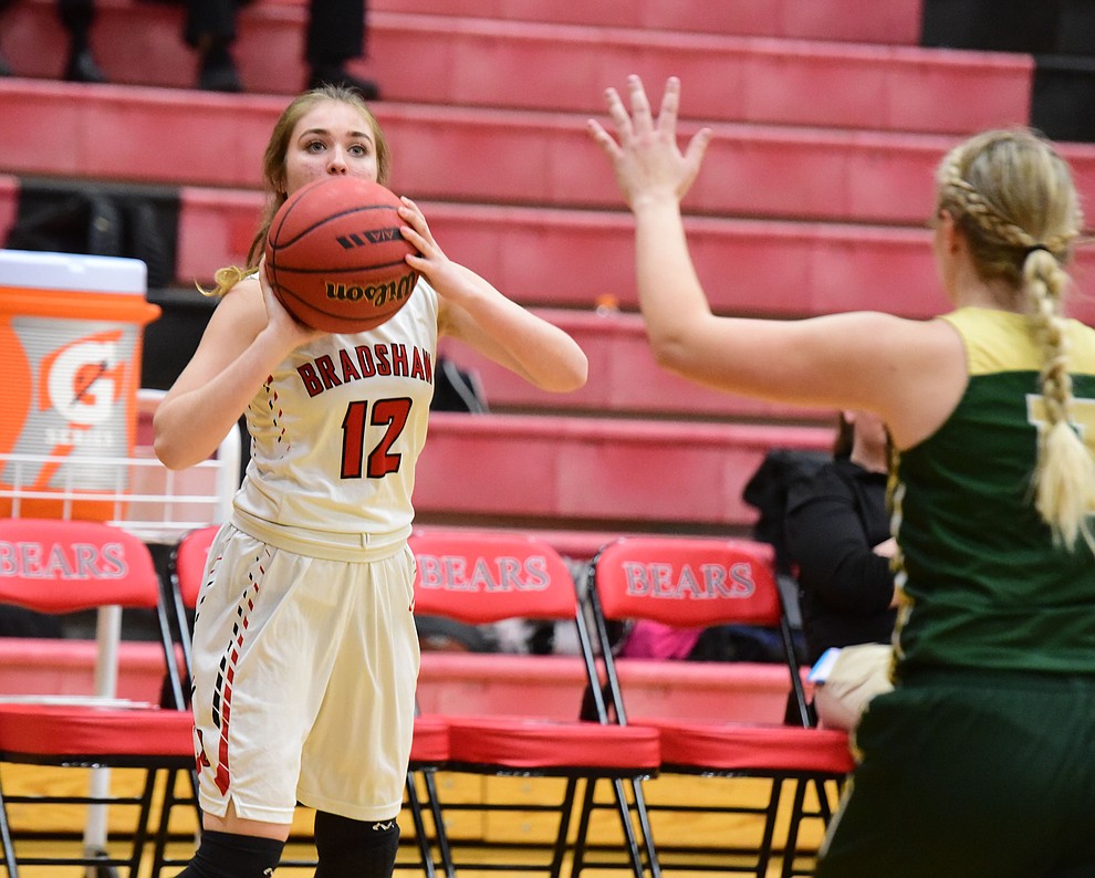 Bradshaw Mountain's Macy Fournier lines up a three-point shot as the Bears host the Mohave Thunderbirds in a basketball matchup Friday night in Prescott Valley. (Les Stukenberg/Courier).