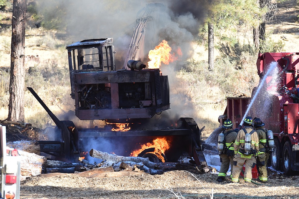 Prescott Fire, Central Arizona Fire, National Forest Service, Yavapai County Sheriff deputies and Lifeline Ambulance personnel responded to the United Christian Youth Camp on Cold Springs Road off of Copper Basin Road in Prescott for a logging machinery fire Tuesday, Dec. 11, 2018. (Les Stukenberg/Courier).