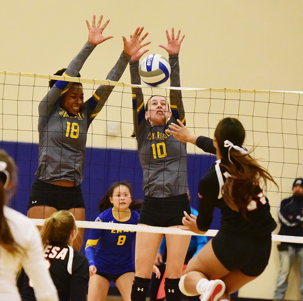 Embry Riddle's Sharik Joseph and Jalin Yoder get a block as they play Benedictine-Mesa in the CalPac Championship Saturday, Nov. 10, 2018 in Prescott. (Les Stukenberg/Courier).