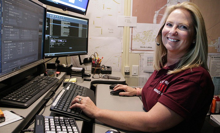 Mary Newton, communications supervisor with the Camp Verde Marshal’s Office, is now an Emergency Number Professional. VVN/Bill Helm