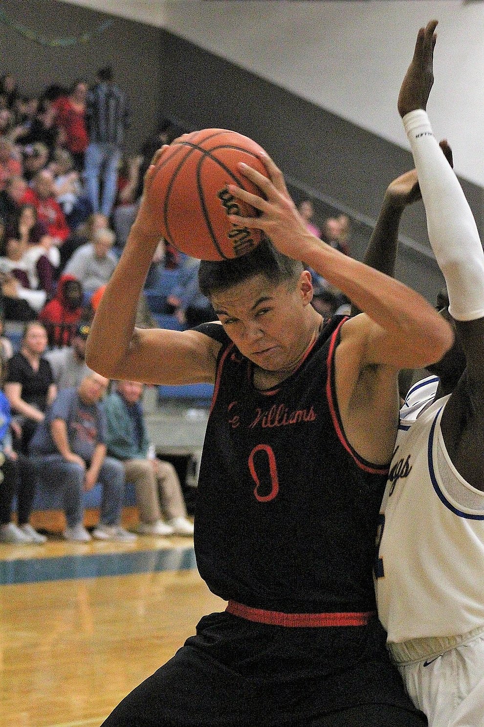November 20 – The Lee Williams High School boys basketball team won a thrilling battle against crosstown rival Kingman High Tuesday night by a score of 68-58.