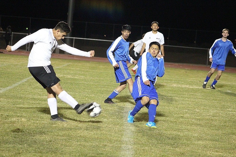 December 3 - The Lee Williams High School boys soccer team won a thriller over Kingman High by a score of 3-2 in double overtime Monday night at KHS.