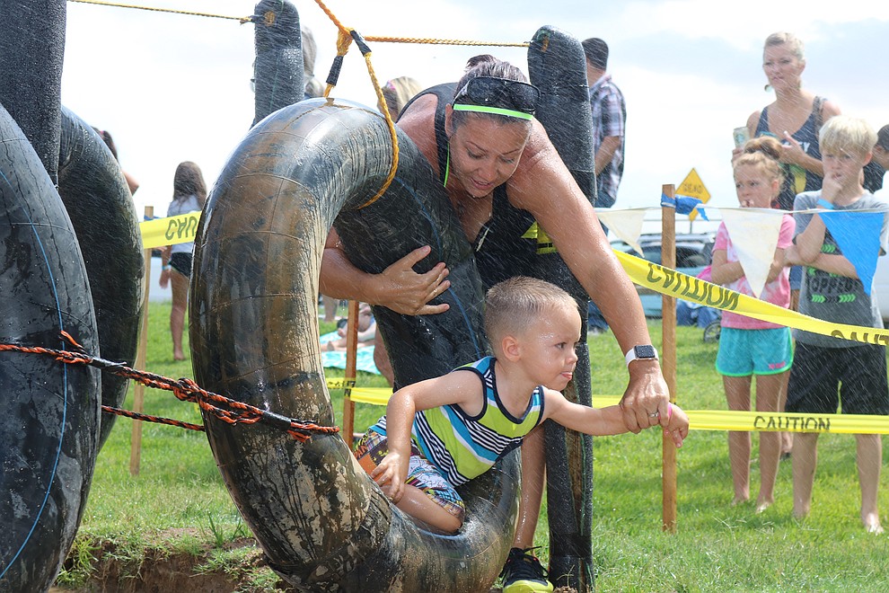 July 13 - Hundreds of children and adults gathered at Firefighters Memorial Park Thursday for Mighty Mud Mania. (Photo by Travis Rains/Daily Miner)