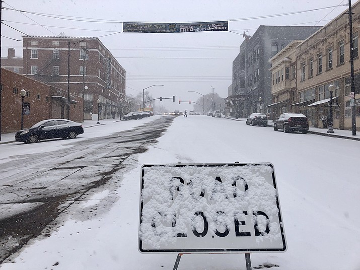 Gurley Street’s steep Elks Hill, in front of the Elks Theater, was among the first streets to be closed on New Year’s Eve Day, Dec. 31, 2018. As the storm progressed throughout the day, many other area streets and highways also were closed because of icy conditions and car crashes. (Cindy Barks/Courier)