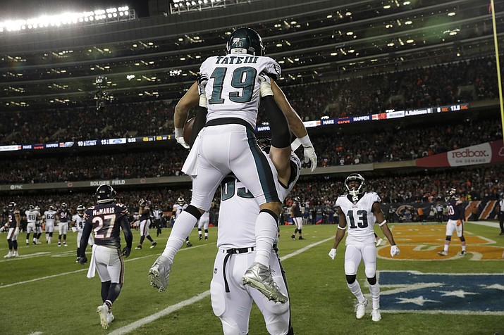 Philadelphia Eagles wide receiver Golden Tate (19) celebrates his touchdown reception with offensive tackle Lane Johnson (65) during the second half of an NFL wild-card playoff football game against the Chicago Bears Sunday, Jan. 6, 2019, in Chicago. (Nam Y. Huh/AP)