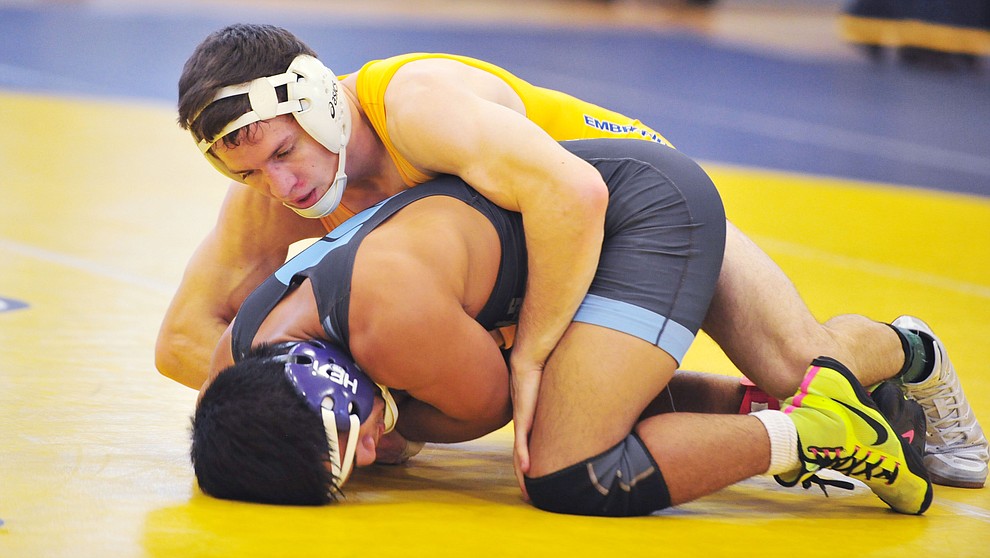Embry Riddle's Collin Anderson, top, works on Alex Ursua as the Eagles take on the Western Pacific Knights in a wrestling dual Monday afternoon in Prescott. (Les Stukenberg/Courier).