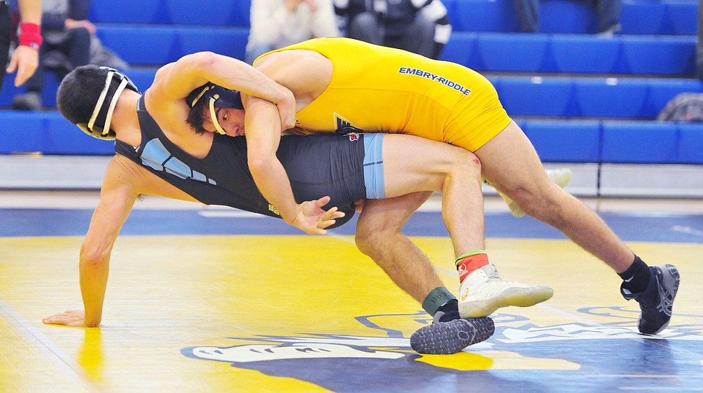 Embry Riddle's James Williams, right, wrestles Chas Peterson as the Eagles take on the Western Pacific Knights in a wrestling dual Monday afternoon in Prescott. (Les Stukenberg/Courier).