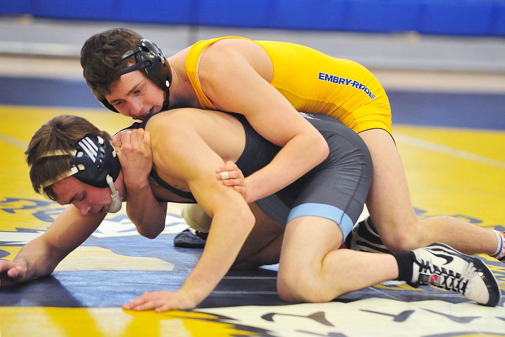 Embry Riddle's Jayce Cunha, right, wrestles Lucas Higginbotham as the Eagles take on the Western Pacific Knights in a wrestling dual Monday afternoon in Prescott. (Les Stukenberg/Courier).