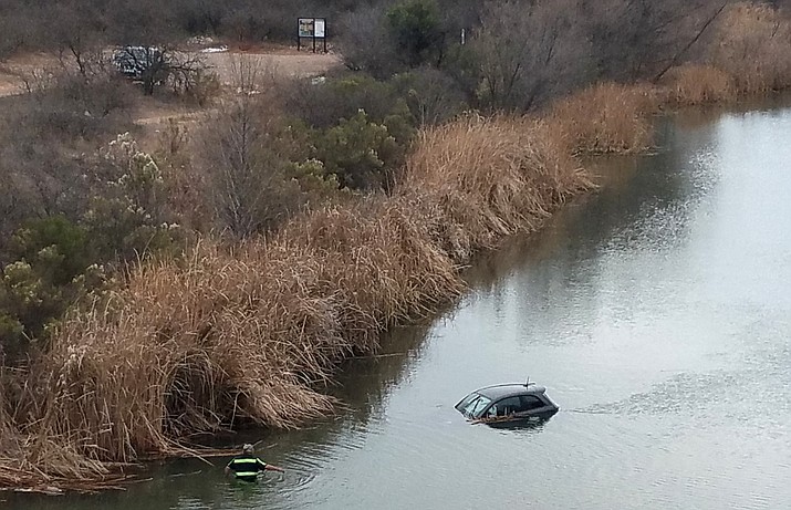 Saturday at about 3 p.m., Clarkdale police were alerted to a vehicle partially submerged in the Verde River at the Tuzigoot River Access Point. Photo courtesy of Clarkdale Police Dept.