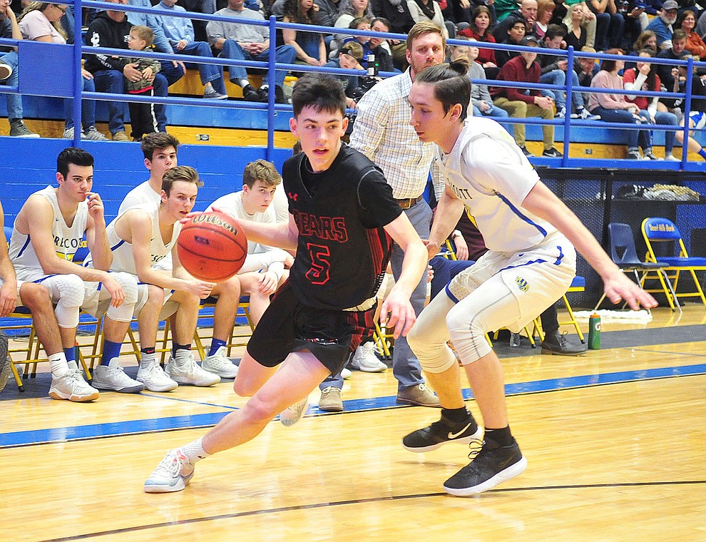Bradshaw Mountains's Tripp Nestor drives to the baseline as the Bears traveled to play the Prescott Badgers Tuesday, January 8, 2019 in Prescott. (Les Stukenberg/Courier).