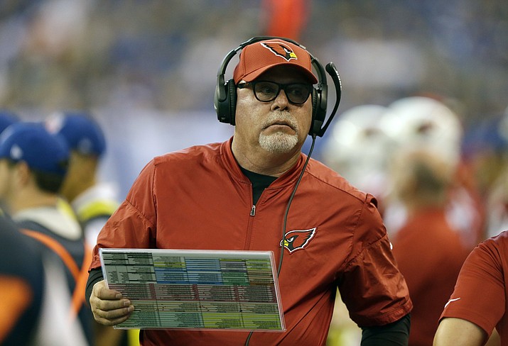 In this Sunday, Sept. 17, 2017 file photo, Arizona Cardinals head coach Bruce Arians watches during the first half of an NFL football game against the Indianapolis Colts in Indianapolis. Bruce Arians is the latest coach entrusted to transform the struggling Tampa Bay Buccaneers into winners. The 66-year-old came out of a one-year retirement to fill the team's fifth coaching vacancy in a decade. Arians replaces Dirk Koetter, who was dismissed Dec. 30, 2018 after leading the Bucs to 19 wins and no playoffs berths over the past three seasons. (Michael Conroy/AP, file)