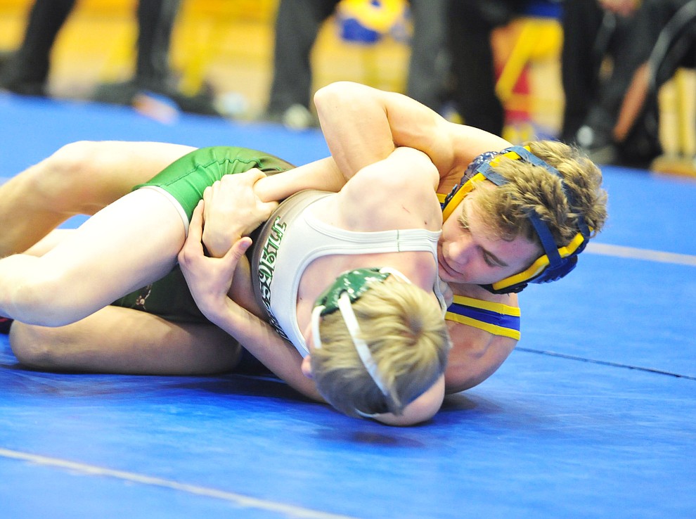 Prescott's Colton Tomitz wrestles Flagstaff's Ian Galloway as the Badgers hosted Flagstaff and Mingus Wednesday, January 9, 2019 in Prescott. (Les Stukenberg/Courier).