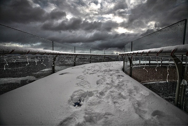 An early snowstorm leaves the Grand Canyon Skywalk on the Hualapai Reservation covered in white powder. Grand Canyon West remains open during the current government shutdown. (Photos courtesy of Grand Canyon West)