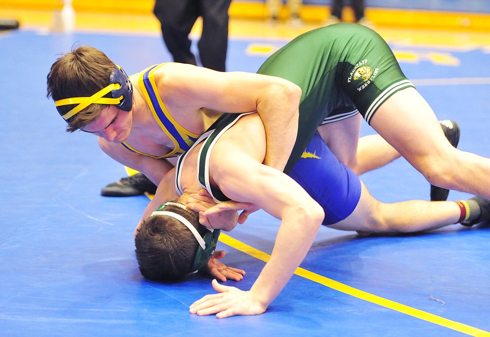 Prescott's Jack Northrup wrestles Flagstaff's Zach Collins as the Badgers hosted Flagstaff and Mingus Wednesday, January 9, 2019 in Prescott. (Les Stukenberg/Courier).