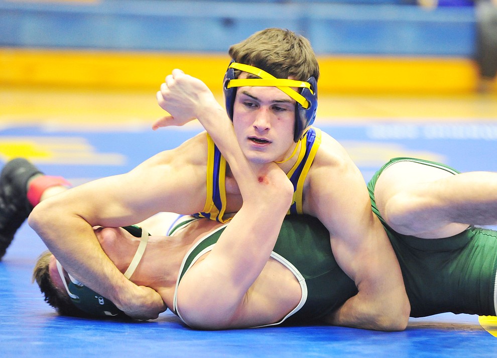 Prescott's Jack Northrup wrestles Flagstaff's Zach Collins as the Badgers hosted Flagstaff and Mingus Wednesday, January 9, 2019 in Prescott. (Les Stukenberg/Courier).