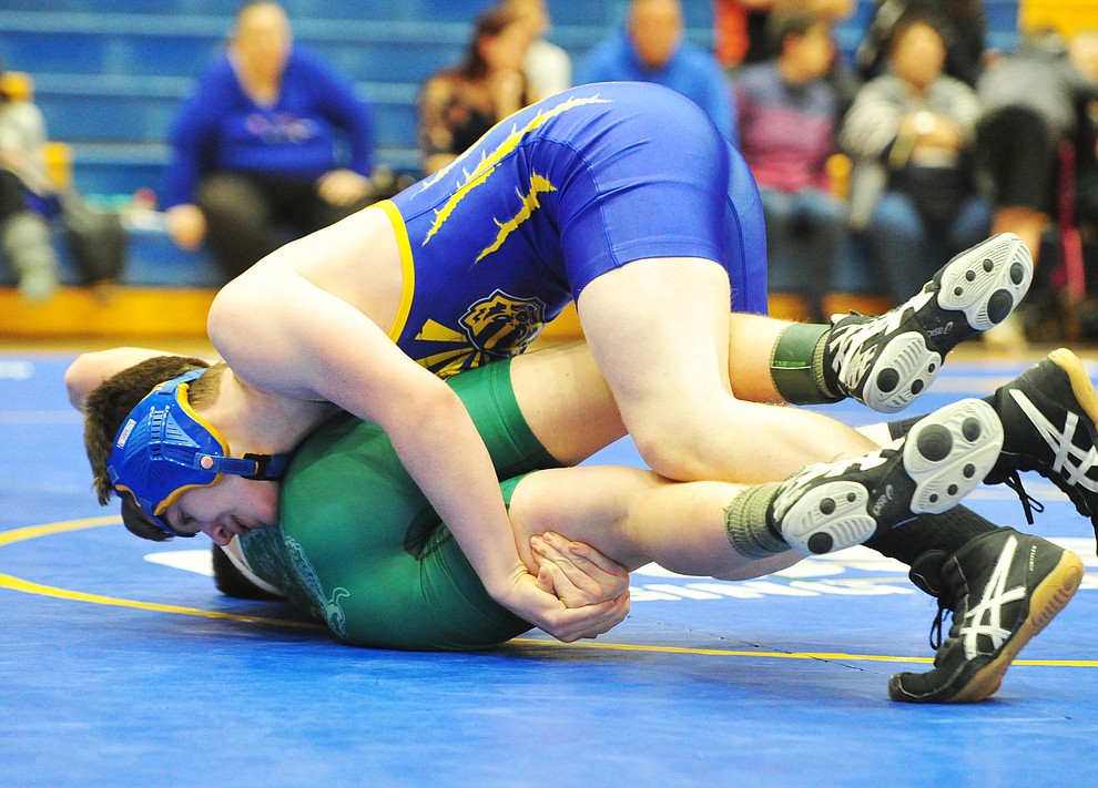 Prescott's Jack Northrup wrestles Flagstaff's Zach Collins as the Badgers hosted Flagstaff and Mingus Wednesday, January 9, 2019 in Prescott. (Les Stukenberg/Courier).