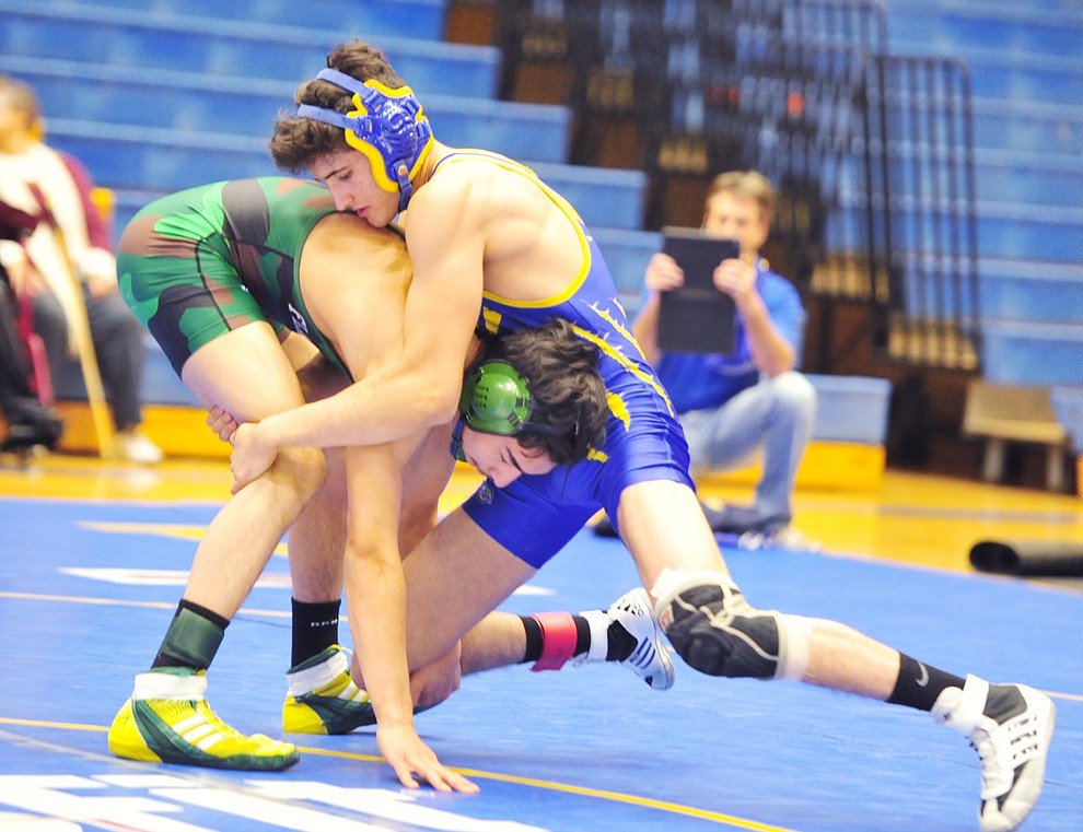 Prescott's Lincoln Eby wrestles Flagstaff's Andre Ryan as the Badgers hosted Flagstaff and Mingus Wednesday, January 9, 2019 in Prescott. (Les Stukenberg/Courier).