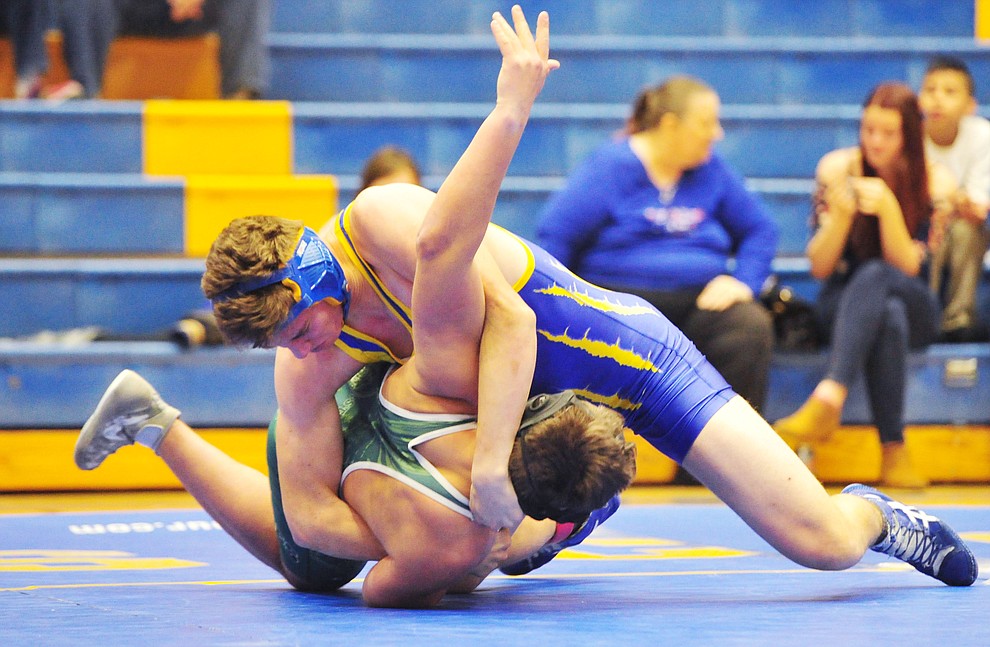 Prescott's Nate Goligoski wrestles Flagstaff's Oleksiy Dishekhonov as the Badgers hosted Flagstaff and Mingus Wednesday, January 9, 2019 in Prescott. (Les Stukenberg/Courier).