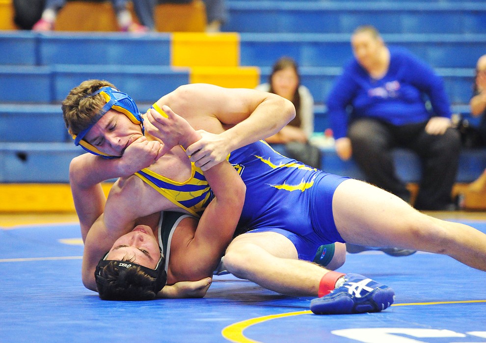 Prescott's Nate Goligoski wrestles Flagstaff's Oleksiy Dishekhonov as the Badgers hosted Flagstaff and Mingus Wednesday, January 9, 2019 in Prescott. (Les Stukenberg/Courier).