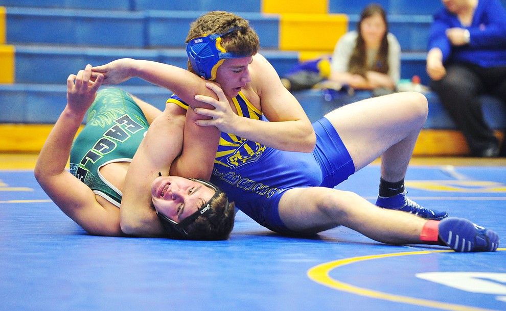 Prescott's Nate Goligoski wrestles Flagstaff's Oleksiy Dishekhonov as the Badgers hosted Flagstaff and Mingus Wednesday, January 9, 2019 in Prescott. (Les Stukenberg/Courier).