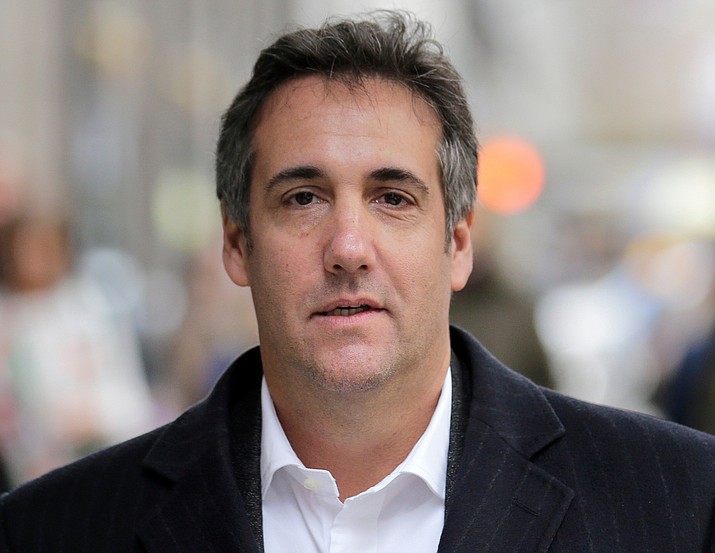 In this April 11, 2018, file photo, Michael Cohen, President Donald Trump's former attorney, walks along a sidewalk in New York. Cohen will testify publicly before Congress in February 2019. (Seth Wenig/AP, file)