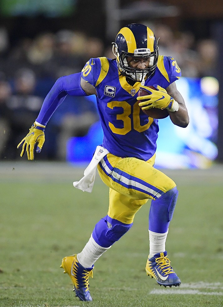 Los Angeles Rams running back Todd Gurley runs against the Dallas Cowboys during the first half in an NFL divisional football playoff game Saturday, Jan. 12, 2019, in Los Angeles. (Mark J. Terrill/AP)