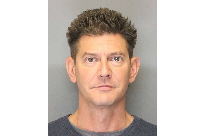 This 2018 booking photo released by the Yolo County Sheriff's Office shows Kevin Douglas Limbaugh. Authorities identified the 48-year-old Limbaugh as the man who shot and killed Davis, Calif., rookie police officer Natalie Corona, 22, on Thursday, Jan. 10, 2019, and later took his own life during a standoff with police. The Sacramento Bee reports that court documents show Limbaugh was convicted in a battery case and agreed in November to surrender a semiautomatic rifle. (Yolo County Sheriff's Office via AP)