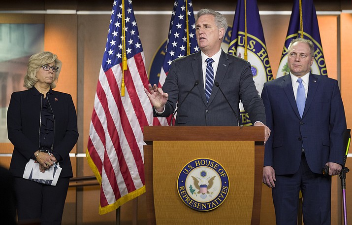 House Minority Leader Kevin McCarthy of Calif., center, speaks accompanied by House Republican Conference chair Rep. Liz Cheney, R-Wyo., left, and House Minority Whip Steve Scalise of La., during a news conference on Capitol Hill, Tuesday, Jan. 15, 2019 in Washington. (AP Photo/Alex Brandon)