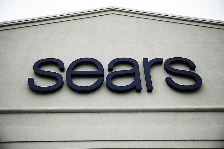 This Oct. 15, 2018 file photo shows a sign for a Sears Outlet department store is displayed in Norristown, Pa. Multiple media outlets reported early Wednesday, Jan. 16, 2019, that billionaire Eddie Lampert has won a bankruptcy auction after strengthening his bid in several days of negotiations with creditors. Lampert, Sears’ chairman and largest shareholder, upped his offer to more than $5 billion and added a $120 million cash deposit through an affiliate of his ESL hedge fund. (AP Photo/Matt Rourke, File)