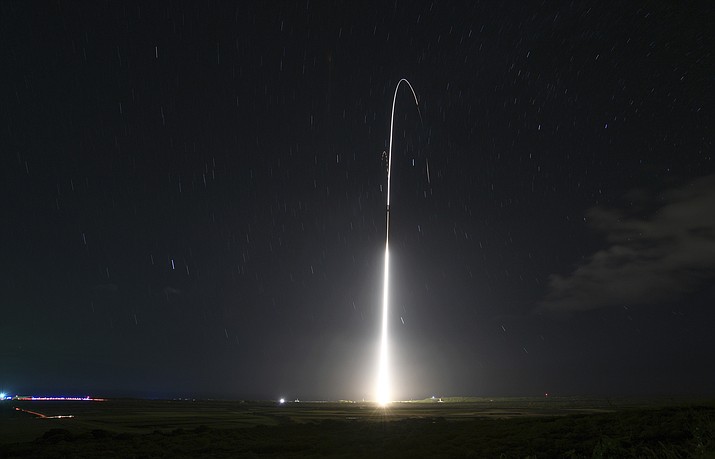 This Dec. 10, 2018, file photo, provided by the U.S. Missile Defense Agency (MDA),shows the launch of the U.S. military's land-based Aegis missile defense testing system, that later intercepted an intermediate range ballistic missile, from the Pacific Missile Range Facility on the island of Kauai in Hawaii. (Mark Wright/Missile Defense Agency via AP)
