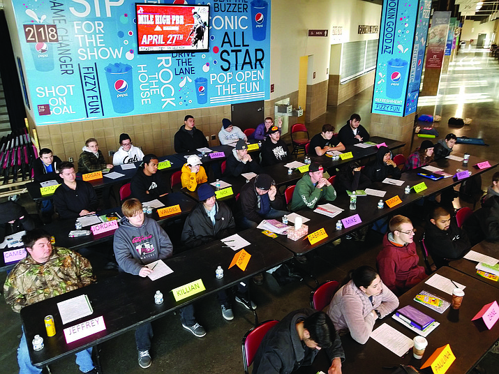 Students in the YCCA Job Readiness Boot Camp listen to a speaker during the first week of classes. (Courtesy)