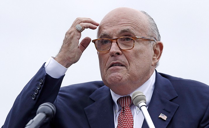 Rudy Giuliani, an attorney for President Donald Trump, addresses a gathering during a campaign event Aug. 1, 2018, in Portsmouth, N.H. (Charles Krupa/AP, File )
