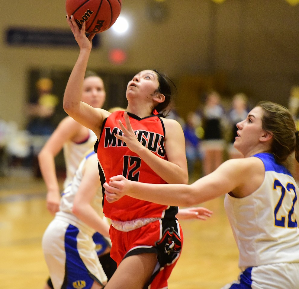 Mingus' Sarah Williams takes thhe ball to the hoop as the Marauders take on the Prescott Badgers Friday Jan. 18, 2019 in Prescott. (Les Stukenberg/Courier).