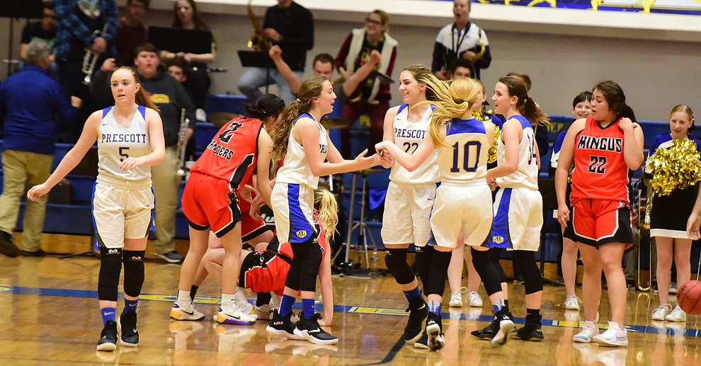 Prescott's Kira Reily (22) celebrates her game winning shot as the Badgers take on the Mingus Marauders Friday Jan. 18, 2019 in Prescott. (Les Stukenberg/Courier).