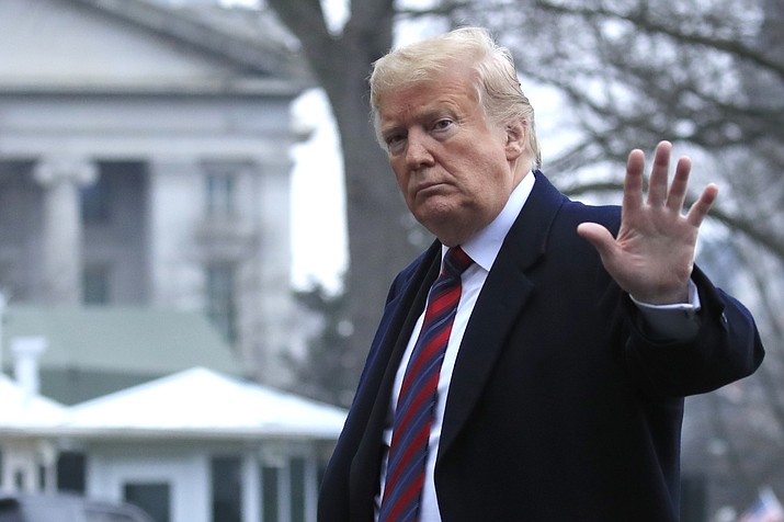 President Donald Trump walks on the South Law upon arrival at the White House in Washington, Saturday, Jan. 19, 2019, after attending the casualty return at Dover Air Force Base, Del., for the remains of four Americans killed in a suicide bomb attack in Syria.. (Manuel Balce Ceneta/AP)