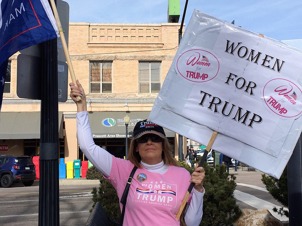 Why are you here today? Carolyn Diaz, 58, Prescott. "I would say I'm a feminist. I came here to escape California. I watched what the left did, they destroyed the state with their pro-immigration, pro-taxes. Here, we can have an opinion. If I wore a Trump T-shirt in California, I'd be dragged out of my car and beaten. Two congress women are forced to wear hijabs by their male leaders and their religion. It's wrong. They say they are choosing it, but they're not. That's what the women should be focused on rather than hating Trump. They should be over there saving these women." (Sue Tone/Courier)