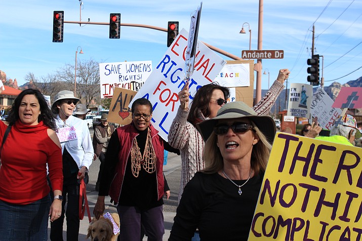 Swaths of marchers from all over the Verde Valley march toward Vino Di Sedona on Saturday, Jan. 19 during the third annual Sedona Women's March. VVN/Kelcie Grega