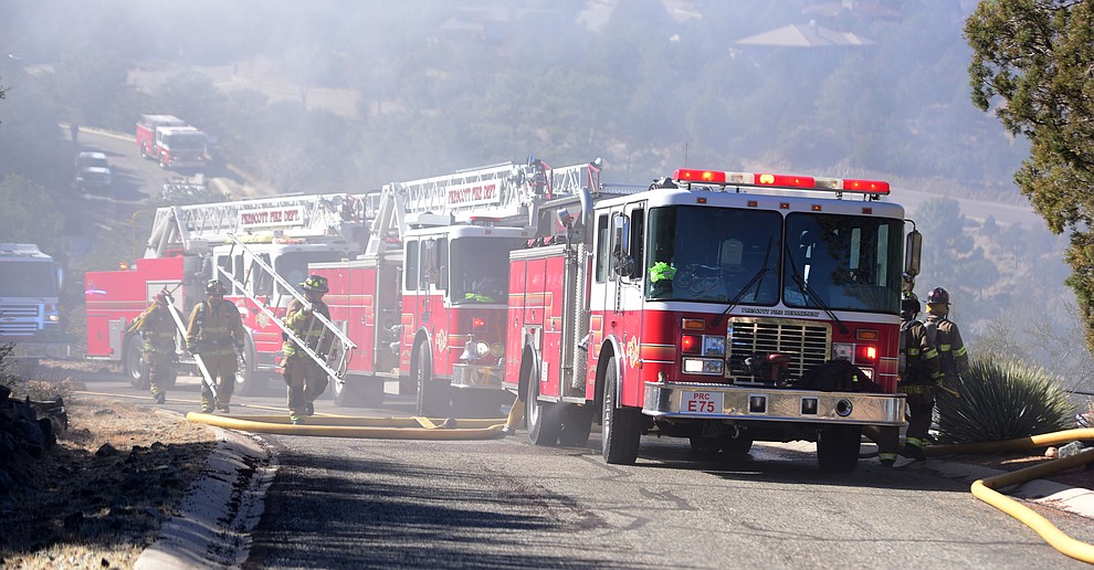 Prescott and Central Arizona and Chino Valley firefighters responded to a three-alarm structure fire in the 3000 block of Rainbow Ridge in the Ranch subdivision of Prescott Tuesday, Jan. 22, 2019. (Les Stukenberg/Courier).