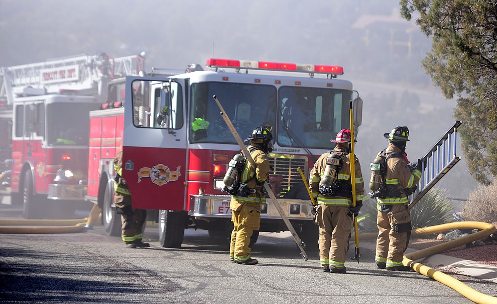 Prescott and Central Arizona and Chino Valley firefighters responded to a three-alarm structure fire in the 3000 block of Rainbow Ridge in the Ranch subdivision of Prescott Tuesday, Jan. 22, 2019. (Les Stukenberg/Courier).