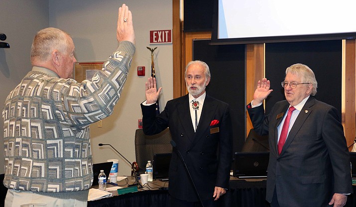 Yavapai College School Superintendent Tim Carter swears in Paul Chevalier, representing District 3 (which includes Sedona); and returning member Ray Sigafoos, who represents District 1 (including Prescott.) Courtesy photo