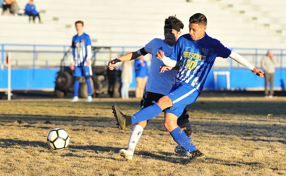 Prescott's Edgar Martinez takes a shot on goal as the Badgers take on the Coconino Panthers Wednesday, Jan. 23, 2019 in Prescott. (Les Stukenberg/Courier).