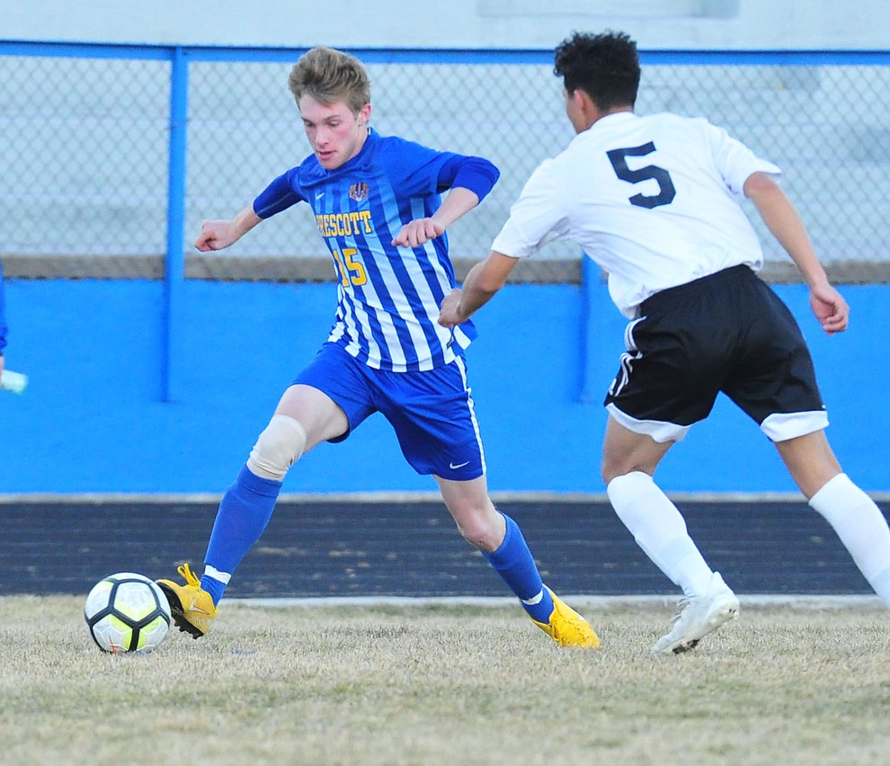 Prescott's Spencer Hewitt controls the ball in the corner as the Badgers take on the Coconino Panthers Wednesday, Jan. 23, 2019 in Prescott. (Les Stukenberg/Courier).