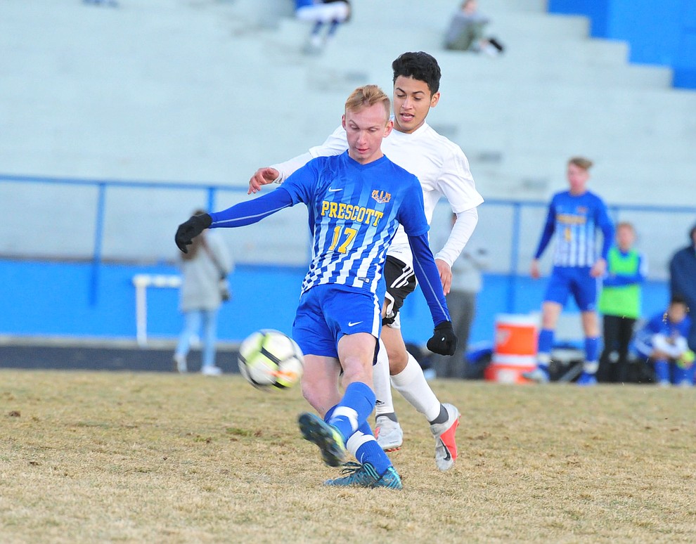 Prescott's Ryan Doyle takes a shot on goal as the Badgers take on the Coconino Panthers Wednesday, Jan. 23, 2019 in Prescott. (Les Stukenberg/Courier).
