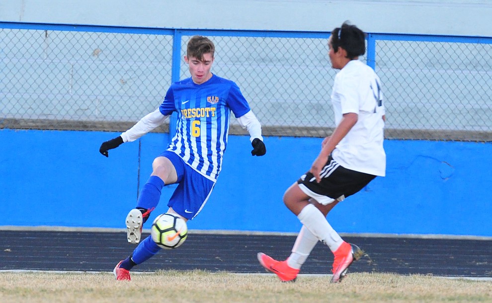 Prescott's Cade Tutrone controls the ball in the corner as the Badgers take on the Coconino Panthers Wednesday, Jan. 23, 2019 in Prescott. (Les Stukenberg/Courier).