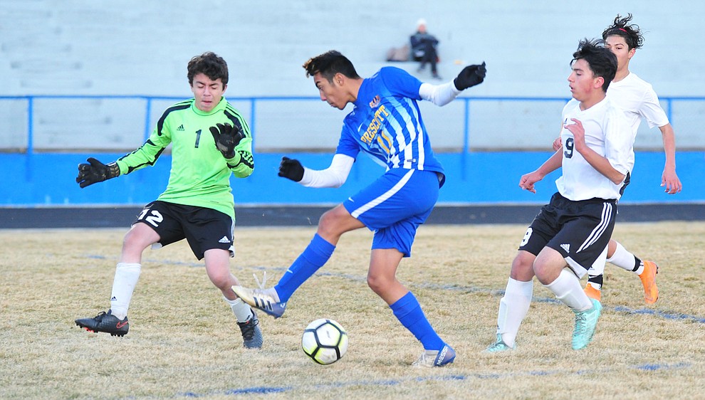 Prescott's Claudio Orozco takes a shot on goal as the Badgers take on the Coconino Panthers Wednesday, Jan. 23, 2019 in Prescott. (Les Stukenberg/Courier).